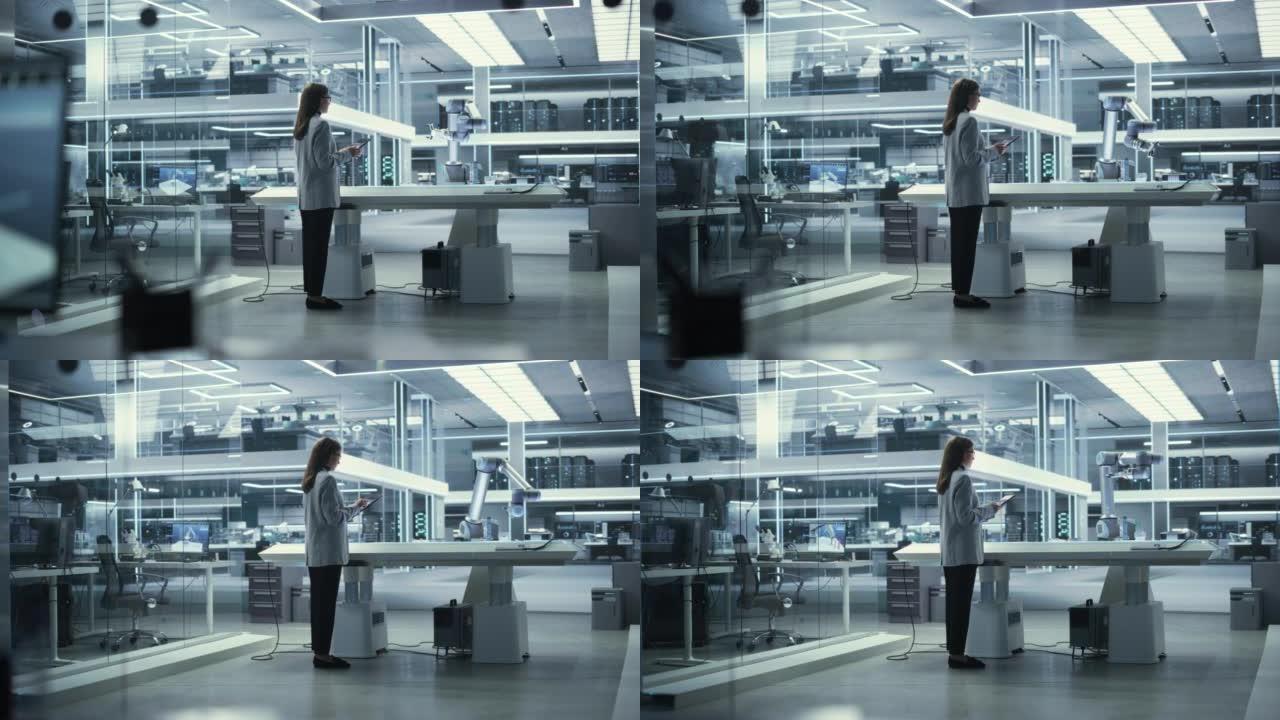 年轻的女工程师使用平板电脑，在具有现代设备的高科技工业实验室中研究和开发具有未来感的机械臂机器。