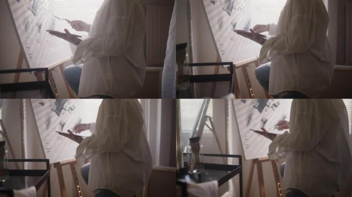 艺术家使用调色板刀绘画