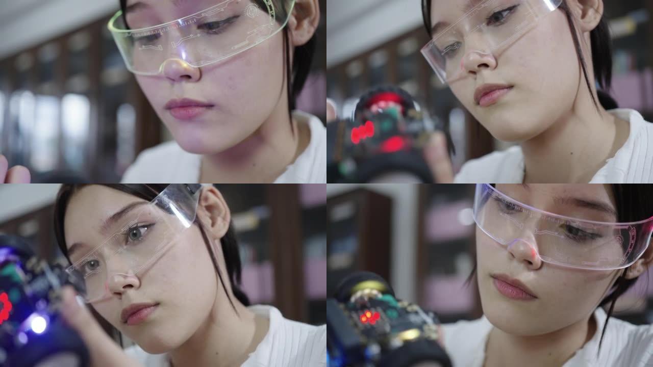 女性青少年为项目学习和分析机器人工程