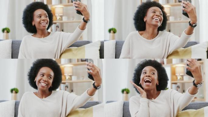 黑人妇女在家里摆姿势，自拍，用手机做一个和平手势。一位快乐开朗的女性在沙发上放松的同时，为社交媒体拍