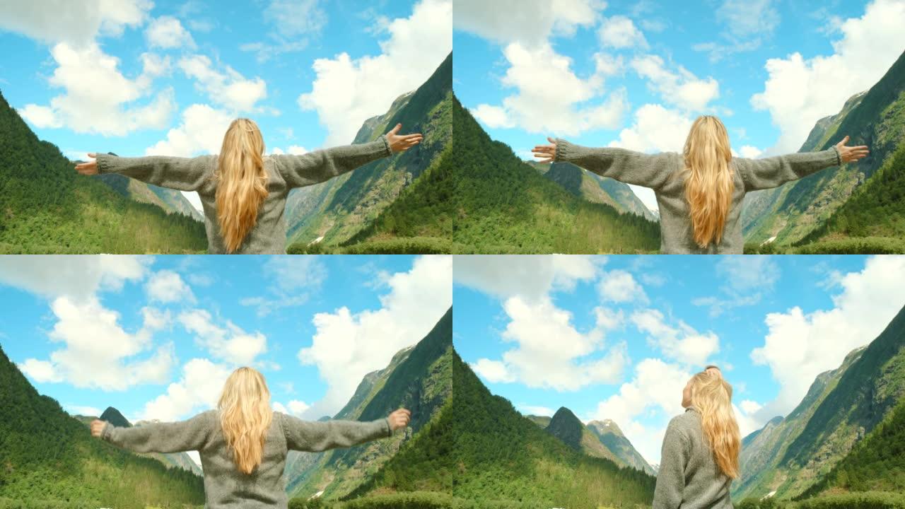 4k视频片段，一个无法识别的女人在m ø re og Romsdal欣赏山景