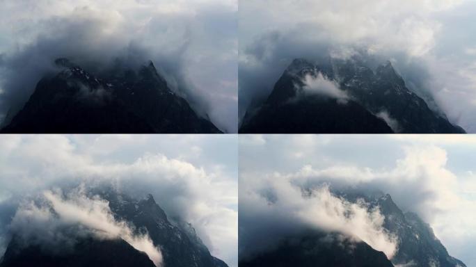 雨后云层中雄伟的山峰