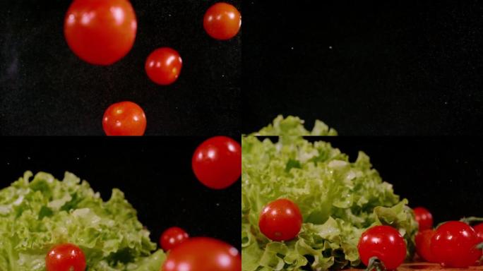 慢动作，特写: 黑色背景上慢动作掉落的红色西红柿
