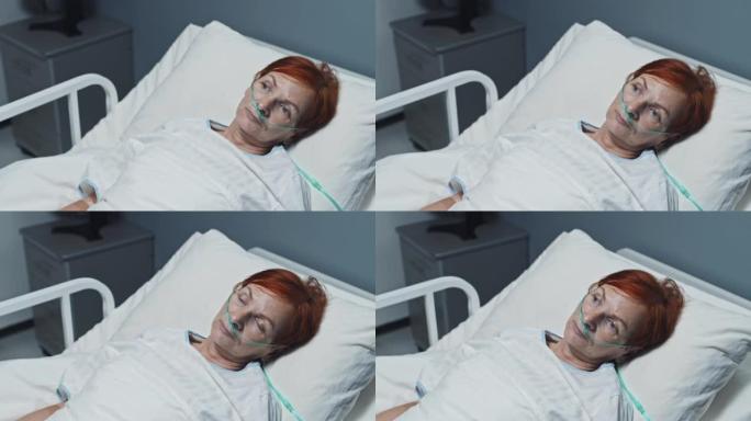 医院病床上有氧气管的女人