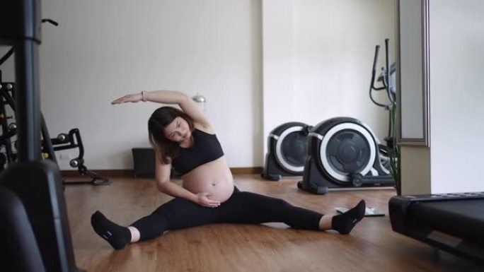 孕妇在健身房锻炼居家办公锻炼