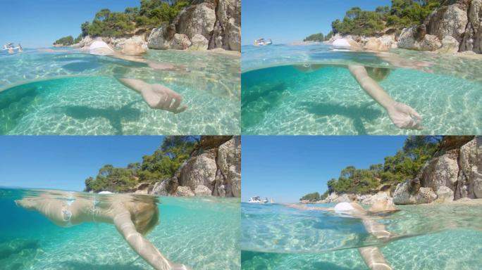 女士无忧无虑的年轻女子漂浮在克罗地亚亚得里亚海阳光明媚的宁静海洋中