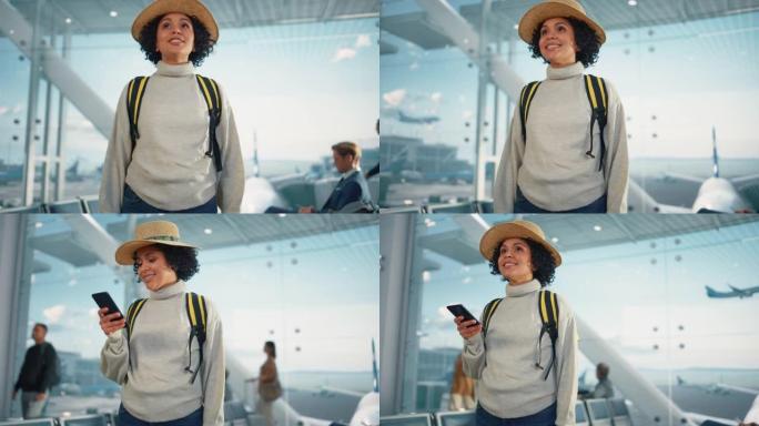 机场航站楼: 快乐旅行的黑人妇女环顾四周搜索登机口和飞机，使用智能手机，在互联网上检查旅行目的地。非