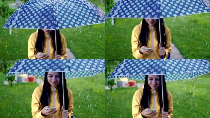 SLO MO年轻女子在雨中使用智能手机玩得开心