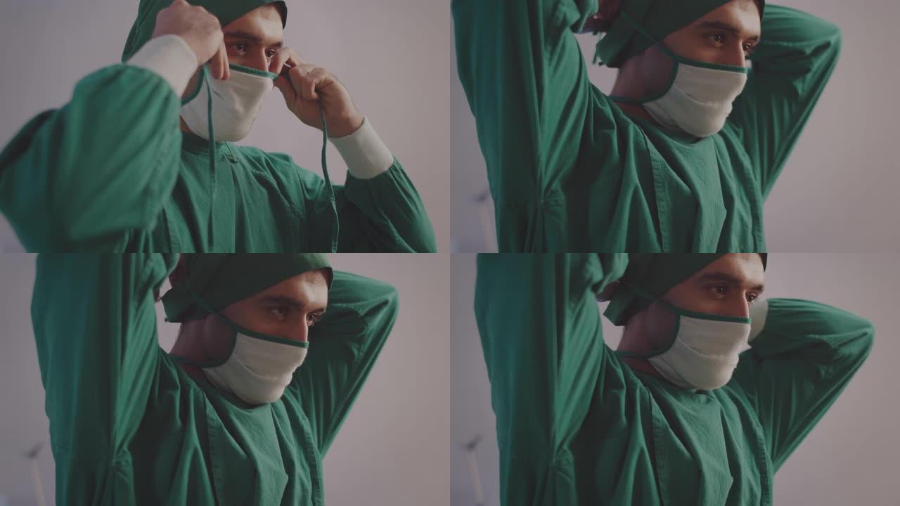 男外科医生在手术室戴上医用口罩