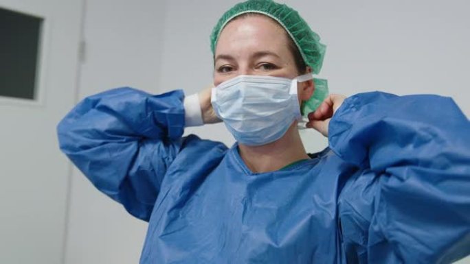 一位女外科医生准备在眼科医院进行手术的肖像