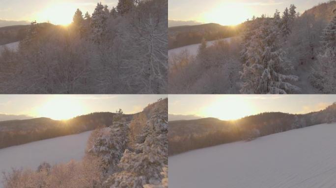空中: 金色的日落照亮了寒冷的乡村
