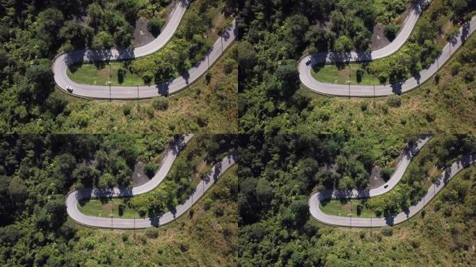 绿色森林中的道路盘山路360度拐弯自驾游
