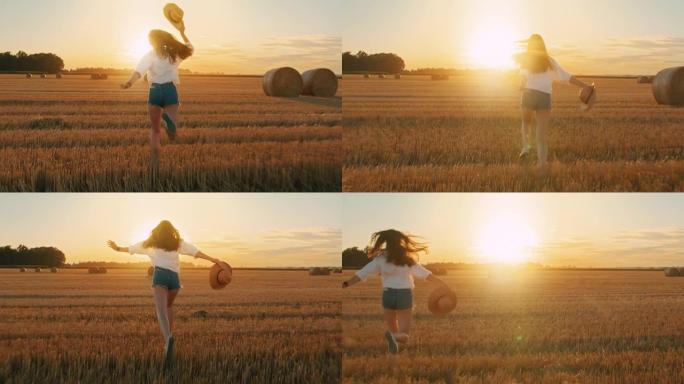 SLO MO年轻女子喜欢在黄金时段满满一捆的田野上奔跑