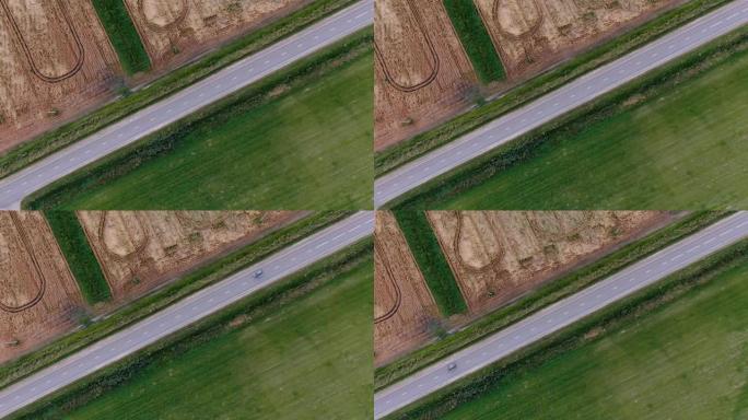 公路槽农田。空中无人机视图，自上而下