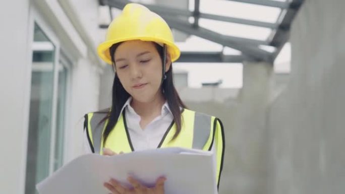 站在建筑工地的亚洲女建筑师肖像