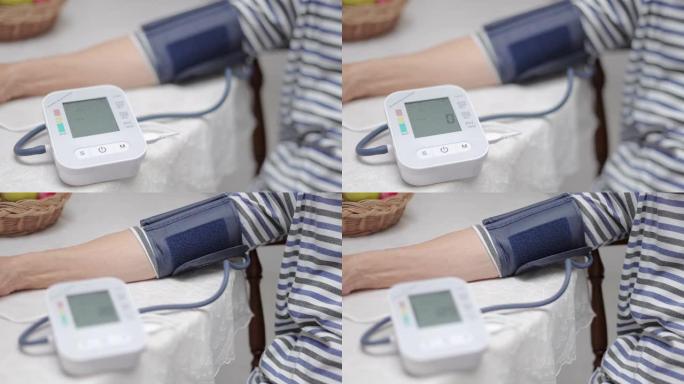特写资深女性在家测量血压