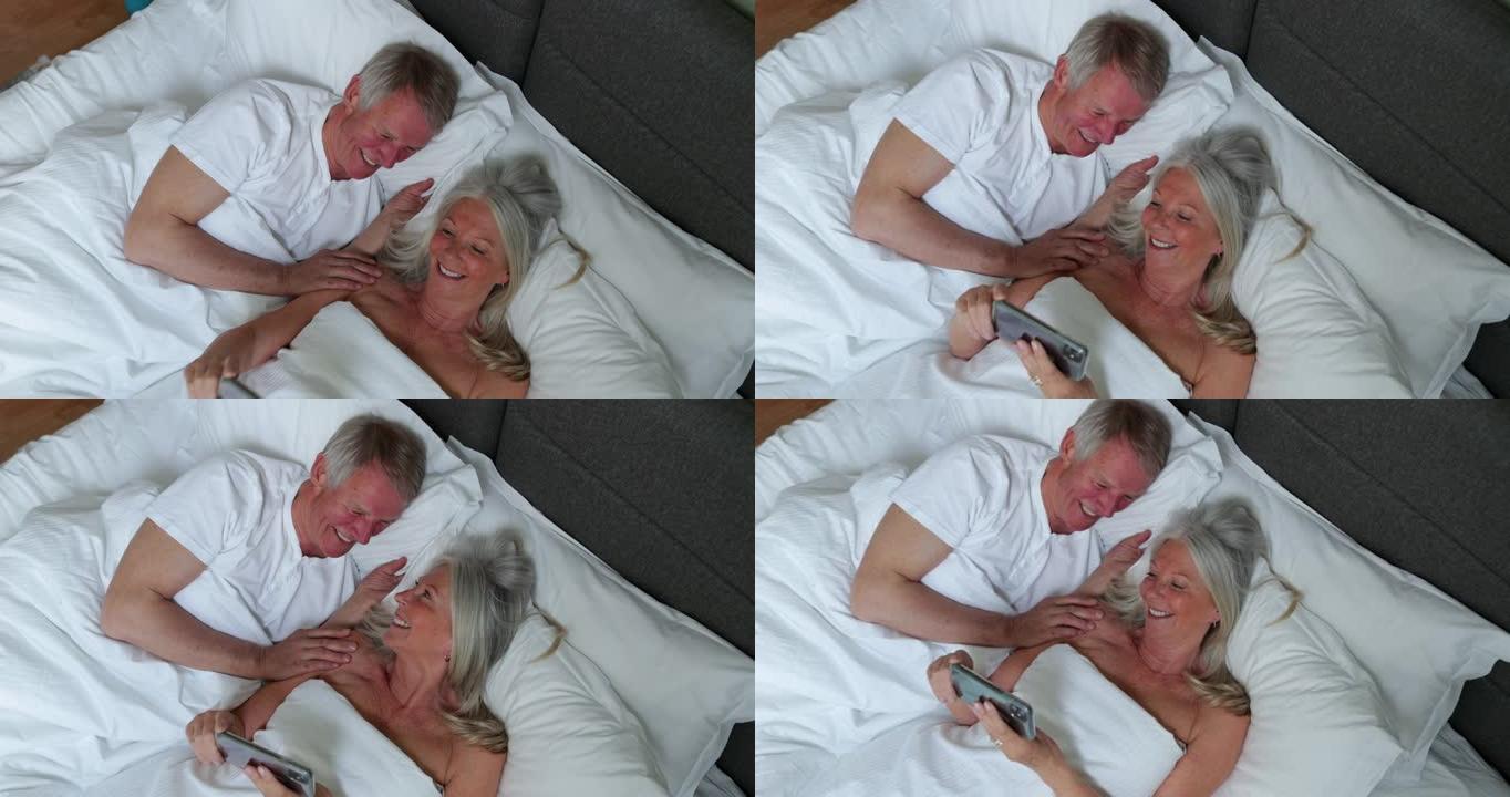 床上懒散的一天外国人外国老人玩手机