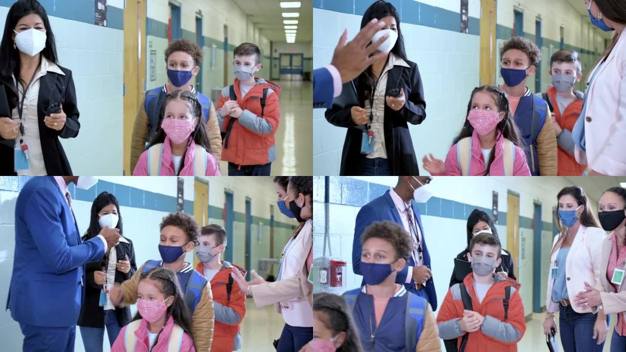 小学生，学校走廊上的老师，口罩