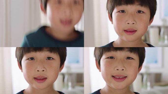 快乐的亚洲小男孩微笑着带着顽皮的表情享受乐趣积极的童年4k镜头的肖像