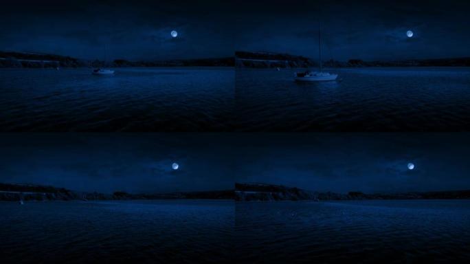 月光下飞过游艇深夜蓝色海洋穿越海港