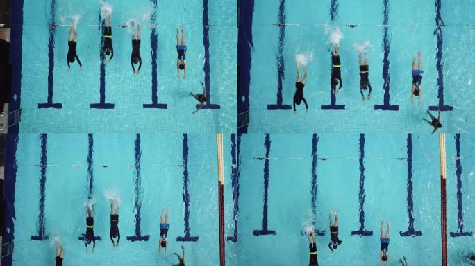 游泳池教练教练正上方的无人机观点教她的学生游泳技能