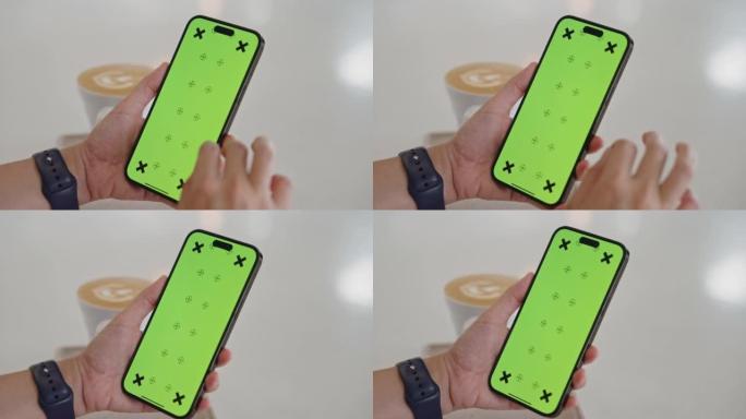 女人使用手机绿屏滑动屏幕色键内容可替换