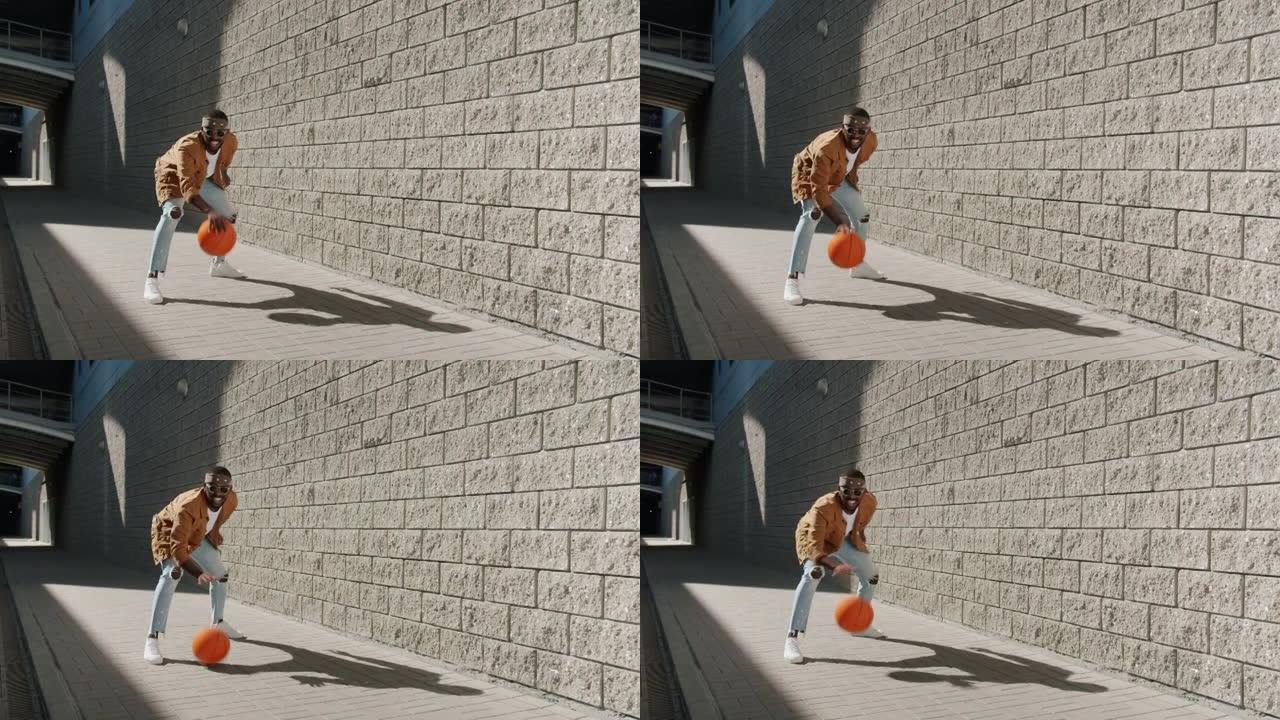 在城市街道上玩篮球的运动型非裔美国人无休止的循环