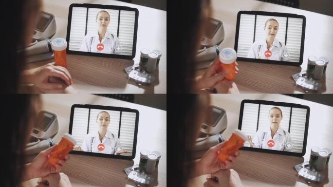 女人在家中与数字平板电脑上的医生进行视频通话