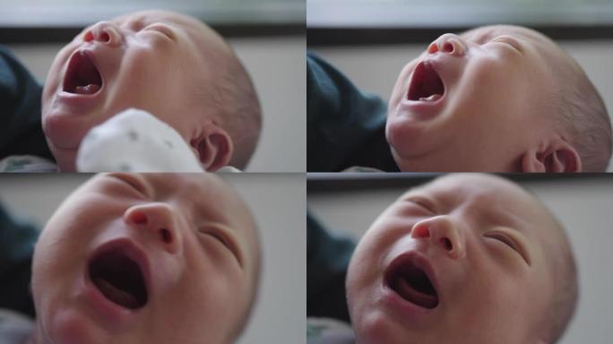婴儿新生儿哭泣的脸部特写