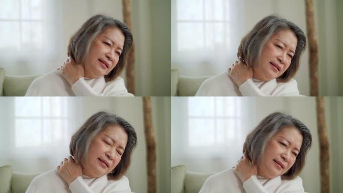 亚洲高级女性按摩治疗师颈部减轻疼痛
