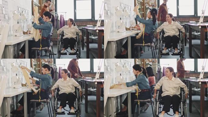 工作场所轮椅上的女性时装设计师