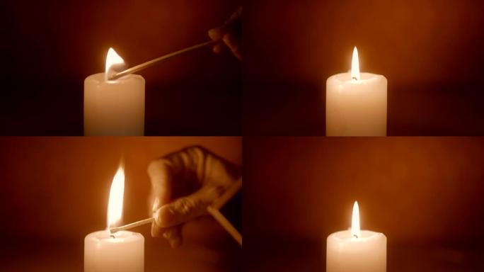 用火柴棍点燃蜡烛点亮烛火光亮