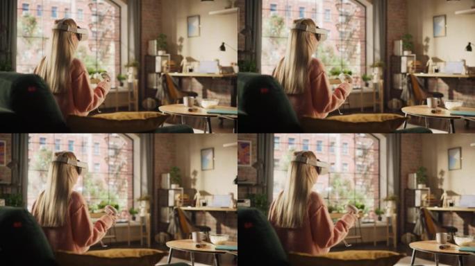 金色头发的女性在家中使用虚拟现实耳机和控制器。有创造力的女人坐在客厅的沙发上，玩VR视频游戏或在特殊