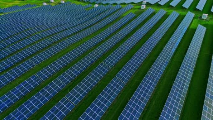 空中无人机在农村太阳能农场成排的太阳能电池板