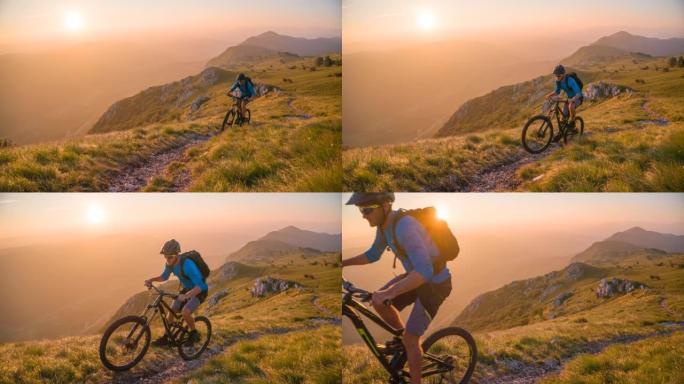 越野自行车上山风景秀丽的山间小径，被日落光照亮