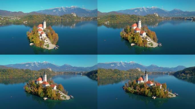 航拍:秋天，湖中央一座小岛上的美丽教堂
