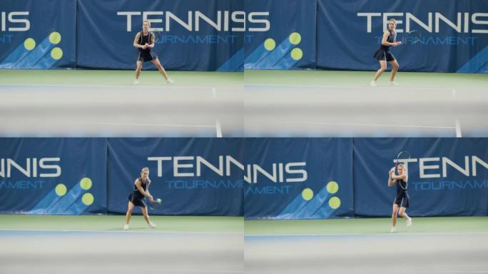 女子网球运动员在冠军赛中用球拍击球。职业女运动员获得并获得完美的射击。世界体育锦标赛。慢动作长镜头回