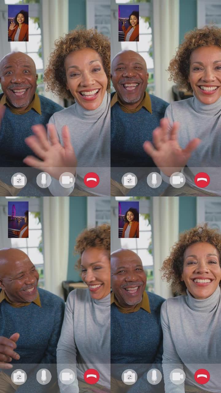 视频设备屏幕和图标，夫妇与访问伦敦眼的朋友进行视频通话