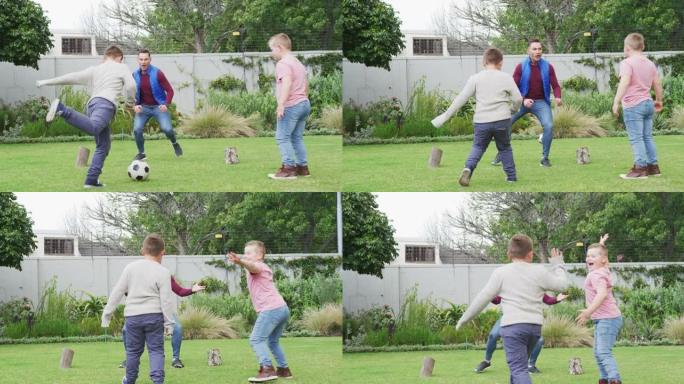 快乐的高加索父亲和两个儿子在花园里踢足球