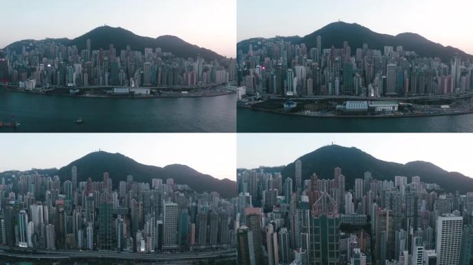 在维多利亚港飞行，城市景观，香港4k分辨率