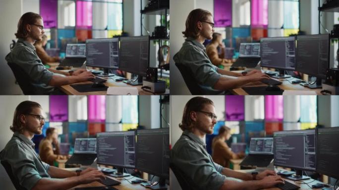 高加索男性软件工程师在台式计算机上编码，在创意办公室有多个显示器。年轻帅哥在科技初创公司为移动应用程