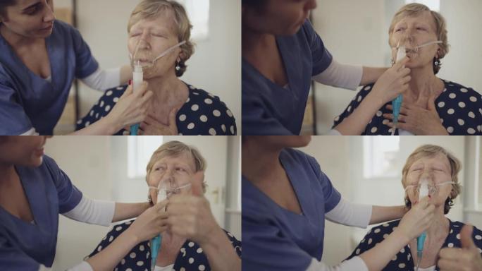 护士帮助一名女性老年患者使用氧气面罩的4k视频片段