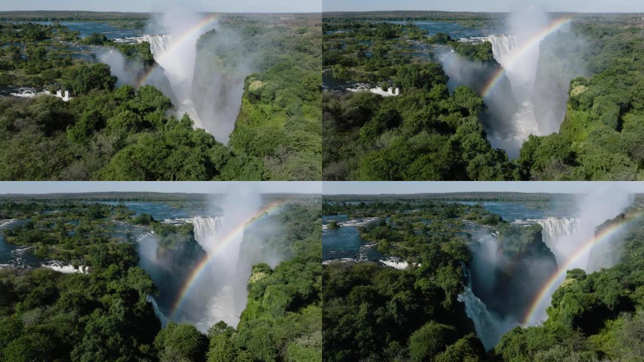 壮观的高空平移视图透过风景秀丽的维多利亚瀑布的彩虹。联合国教科文组织世界遗产