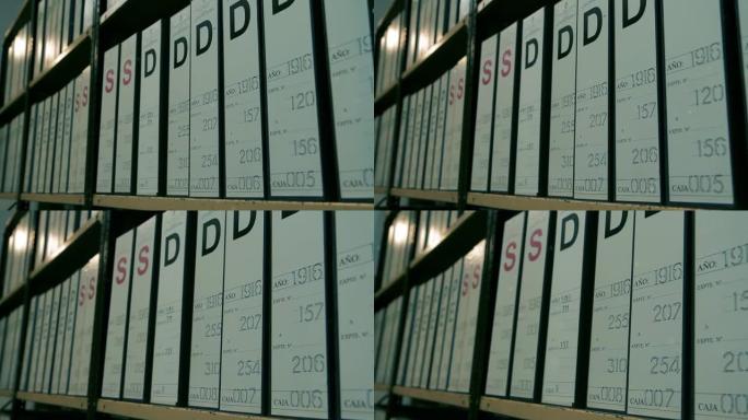 档案文件堆放在档案室，文件存放容器堆放在办公室档案室。近距离拍摄，4K分辨率。