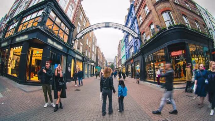 英国伦敦Carnaby街周围人群步行和游客步行和购物的时间流逝
