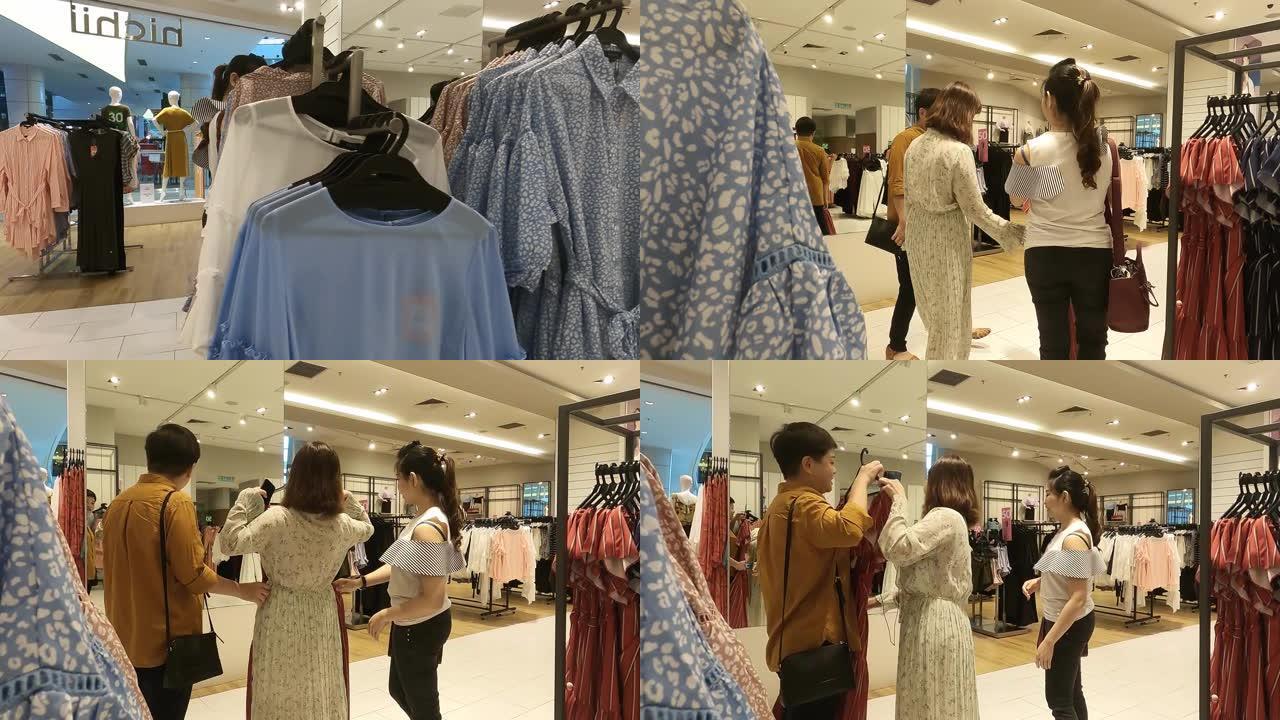 3亚洲华人女性在服装店选择服装