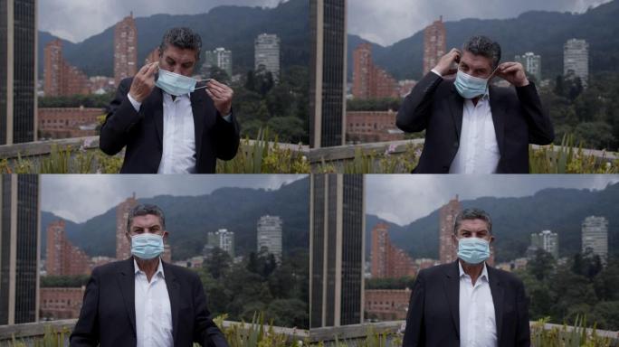 拉丁美洲男子在户外戴上口罩以防冠状病毒