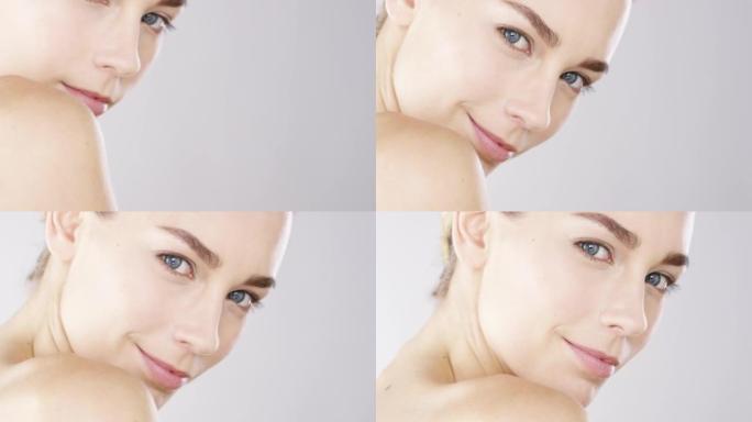 4k视频片段，一个诱人的美女在工作室背景下摆姿势