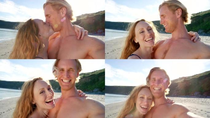 一对年轻夫妇在海滩上共度时光的4k视频片段