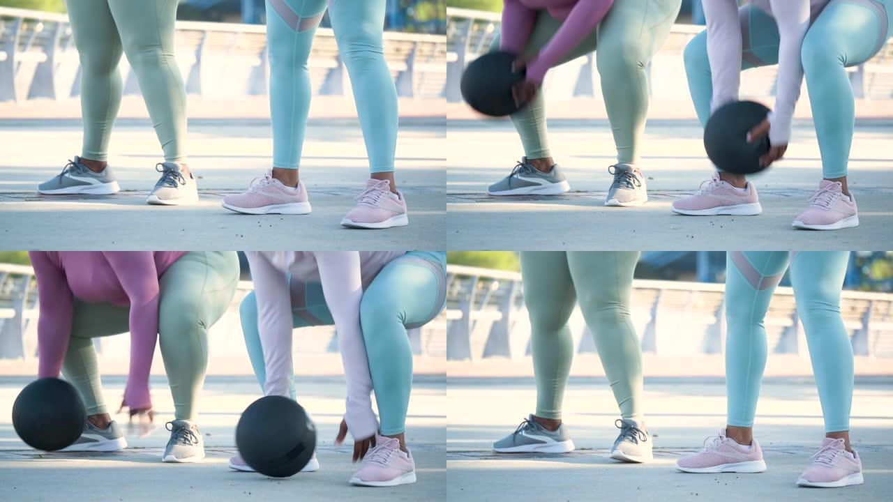 两名非裔美国妇女用药球锻炼